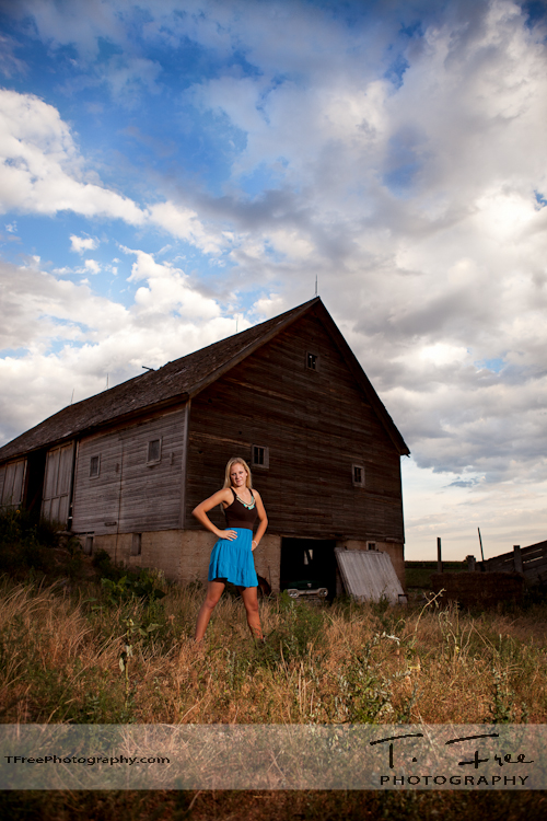 Spectacular senior photo with old barn in western Nebraska.