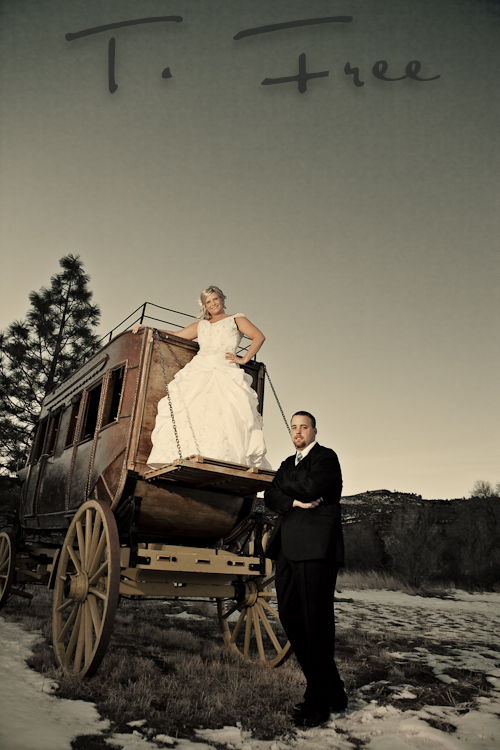 Bride posing on a vintage stagecoach at Sylvan Dale Ranch in Loveland Colorado.