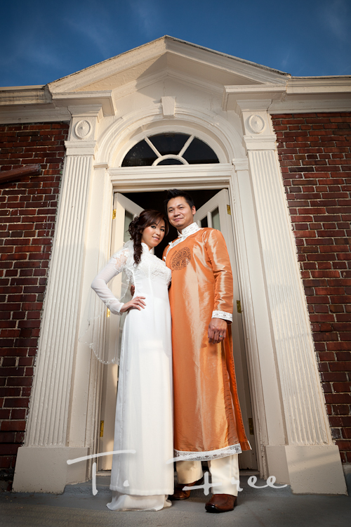 Beautiful image of the bride and groom at the Omaha Magnolia Hotel presidential suite patio entrance.