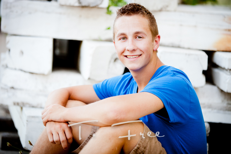 Traditional outdoor senior picture in downtown Omaha, Nebraska.
